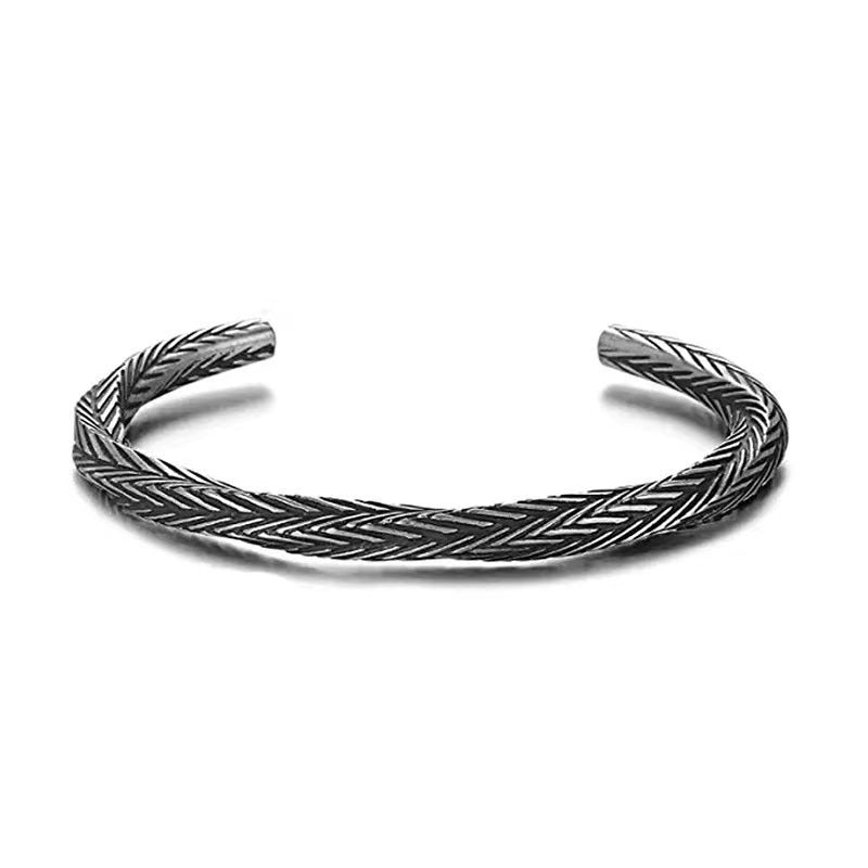 Luxury Metal Bracelet with intricate braided design in silver tone, perfect for premium men's essentials accessories.