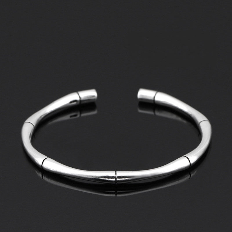 Luxury Metal Bracelet with sleek silver design, reflecting modern minimalism and premium men's accessories style