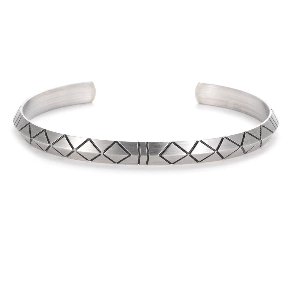Luxury Metal Bracelet with geometric diamond pattern and open cuff design in brushed metal finish
